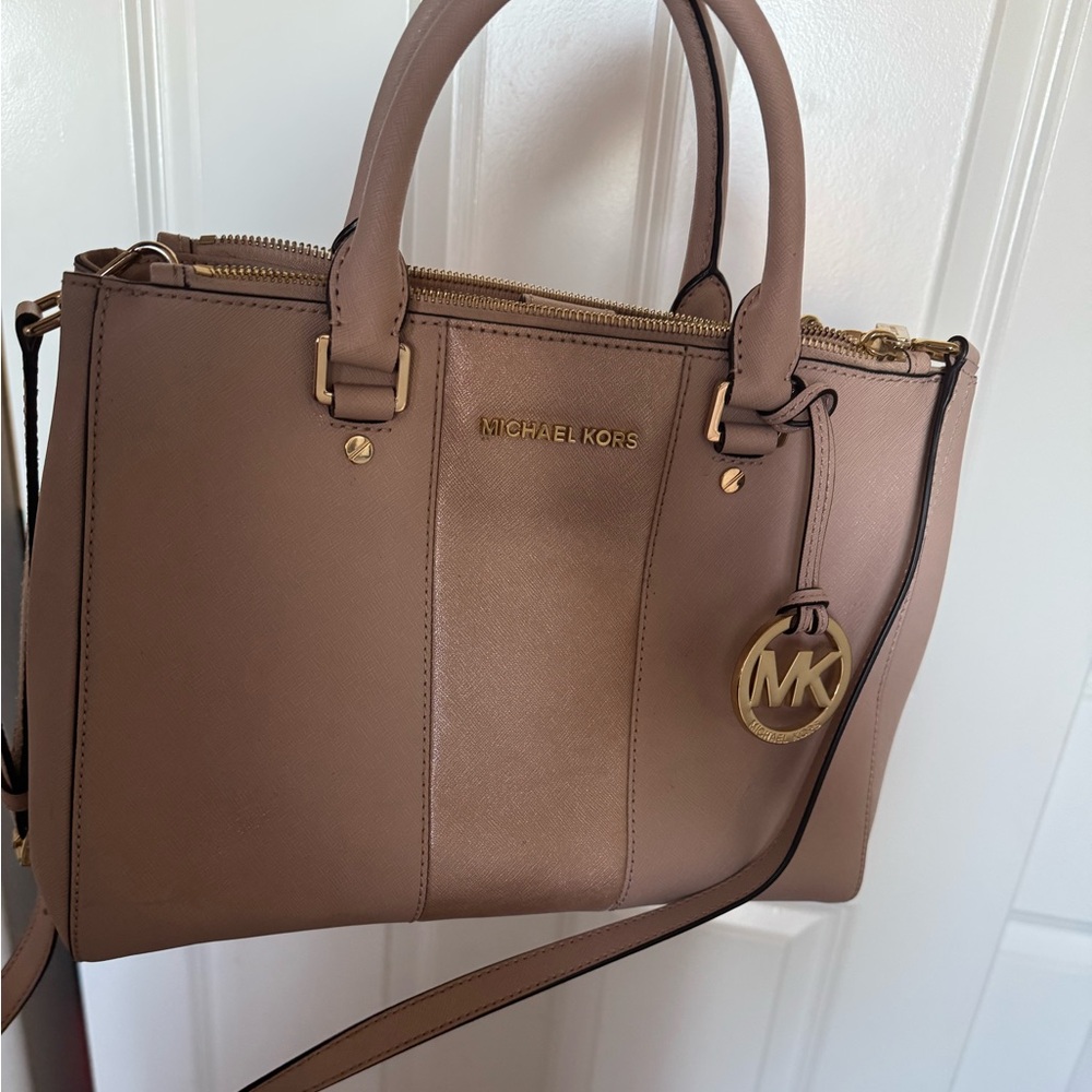 Rose gold Michael kors purse